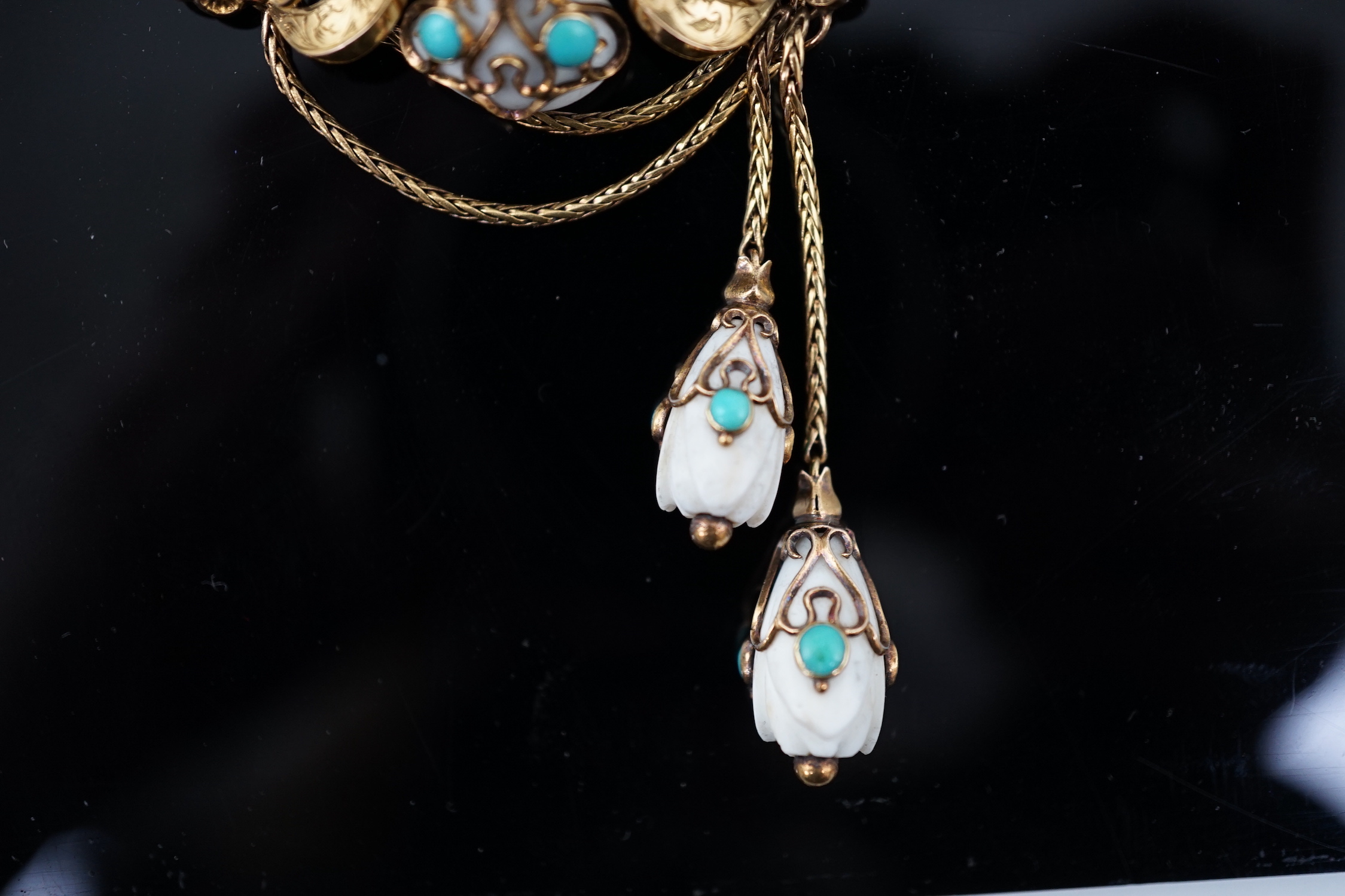 A Victorian engraved gold, white coral and turquoise cluster set tassel drop brooch